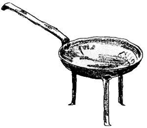 An old iron frying pan with legs, often called a spider.